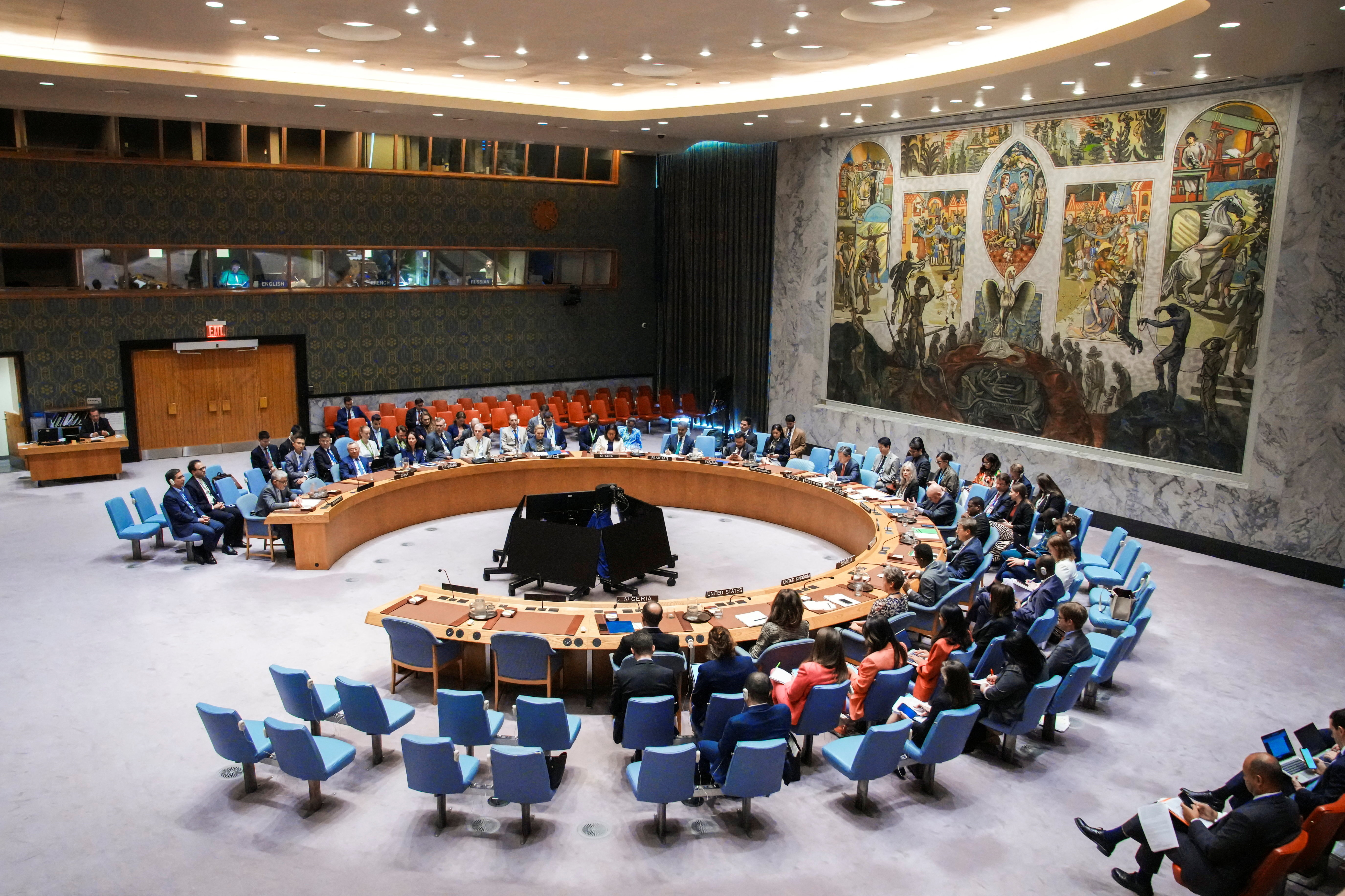 Members of the U.N. Security Council hold a meeting on a resolution that would permanently lift U.N. sanctions on Iran at U.N. headquarters in New York