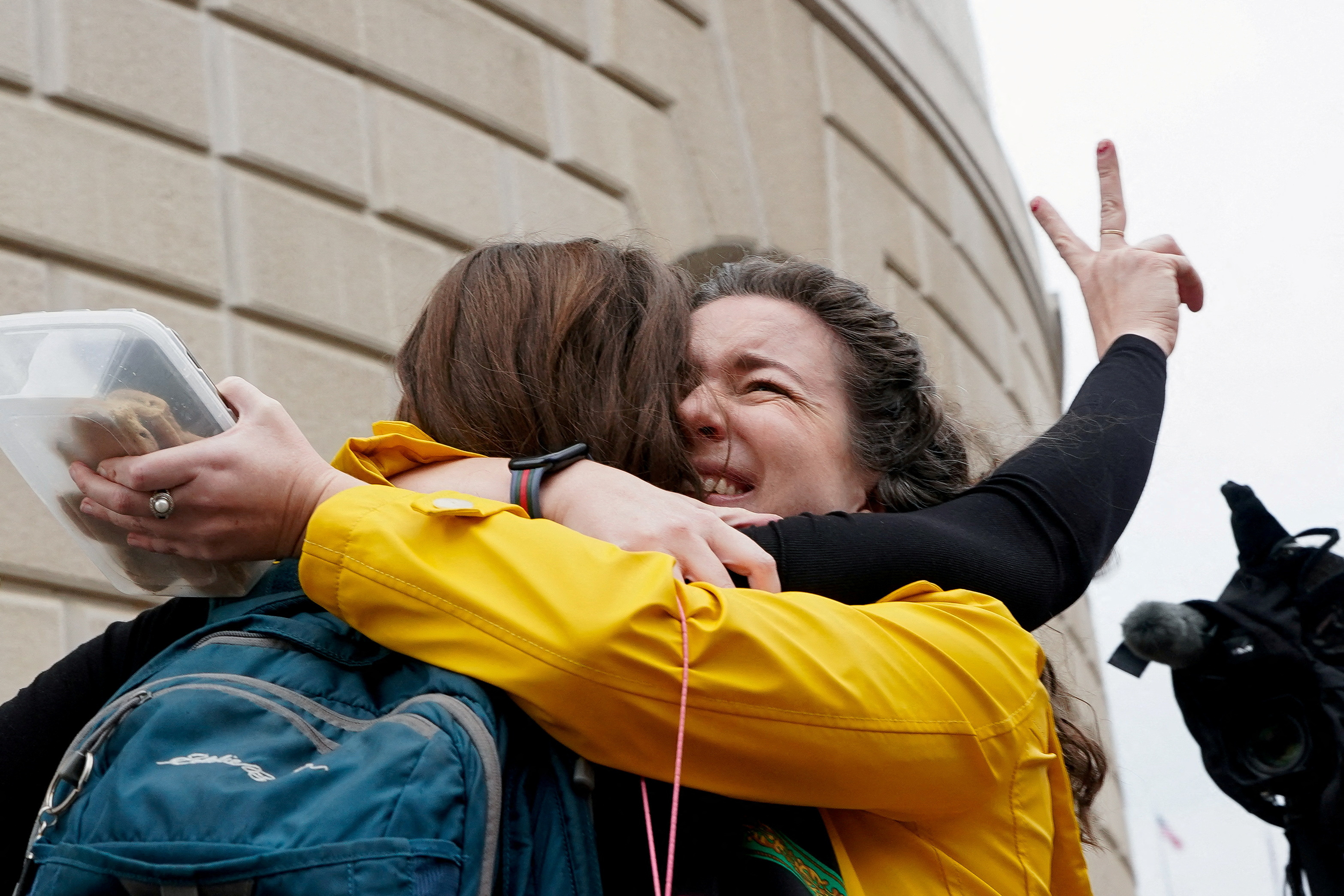 Former U.S. Agency for International Development (USAID) workers are applauded, during a sendoff in Washington