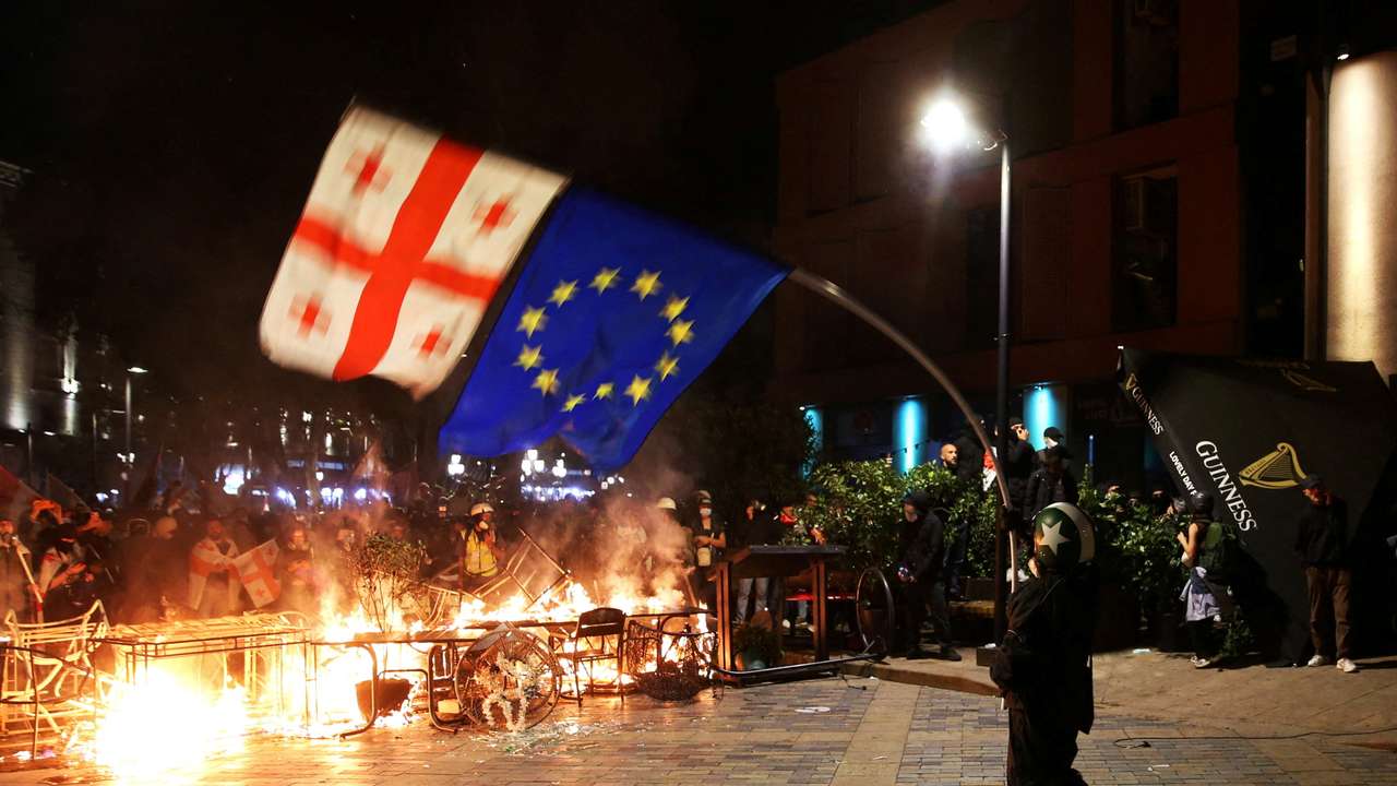 FILE PHOTO: Opposition supporters hold a rally on the day of local elections in Tbilisi