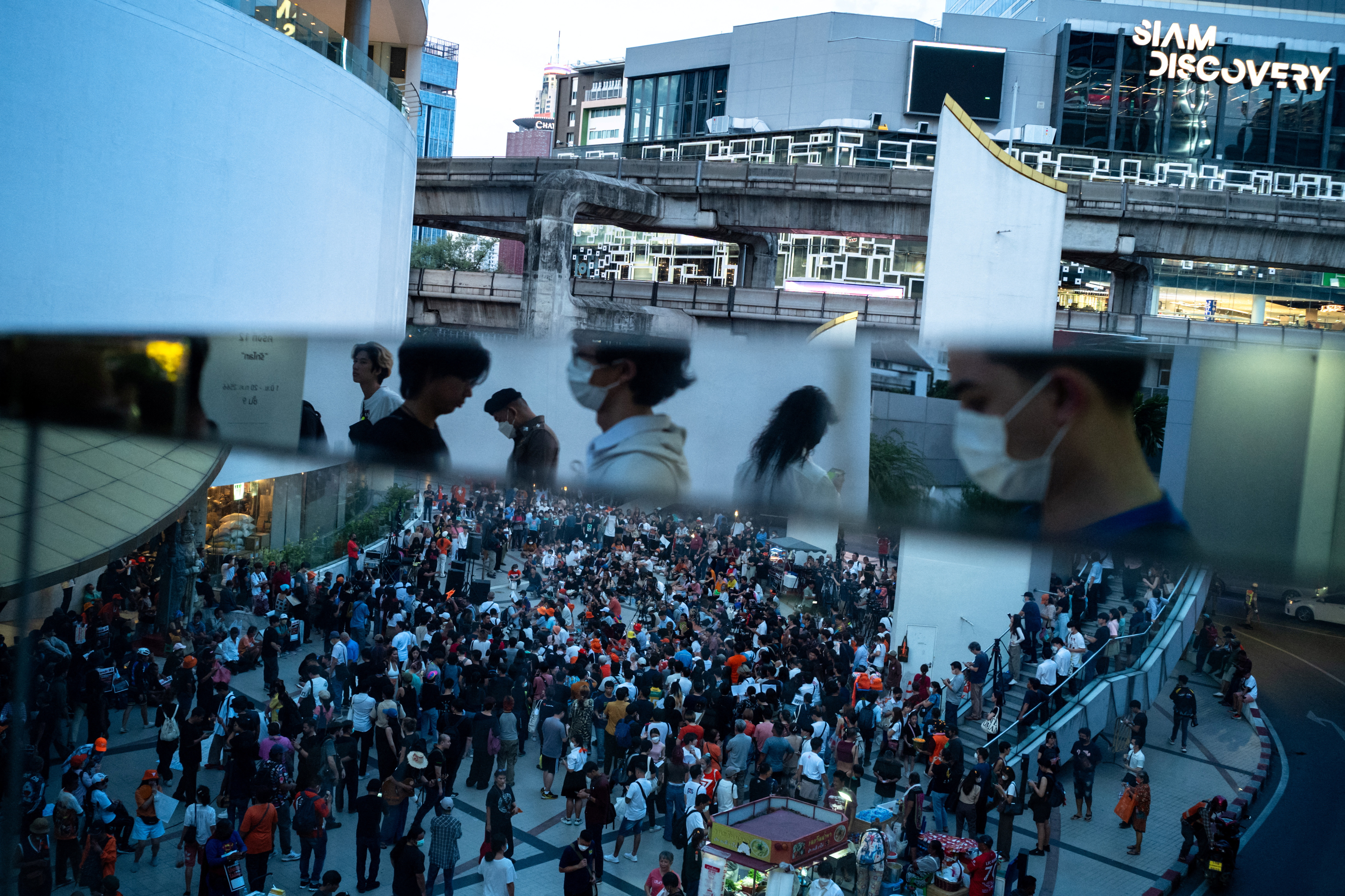 Move Forward Party supporters gather to protest a day after  the party's leader Pita Limjaroenrat failed to win parliamentary support to become prime minister, in Bangkok