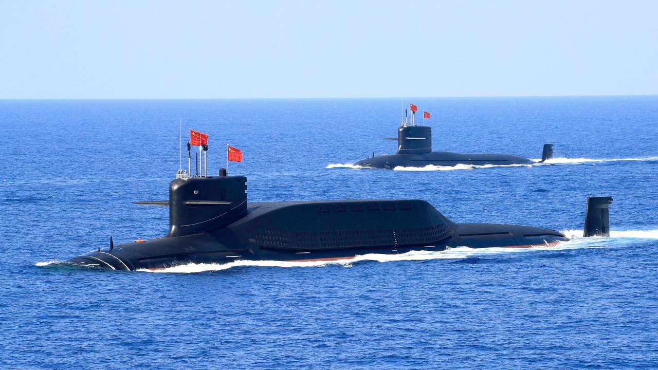 Nuclear-powered Type 094A Jin-class ballistic missile submarine of the Chinese People's Liberation Army (PLA) Navy during a military display in the South China Sea