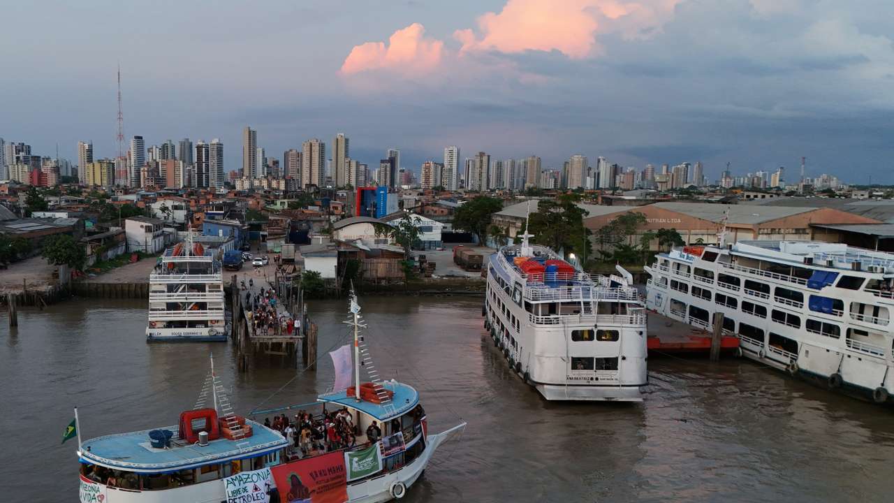 Indigenous flotilla arrives for COP30 climate summit, in Belem