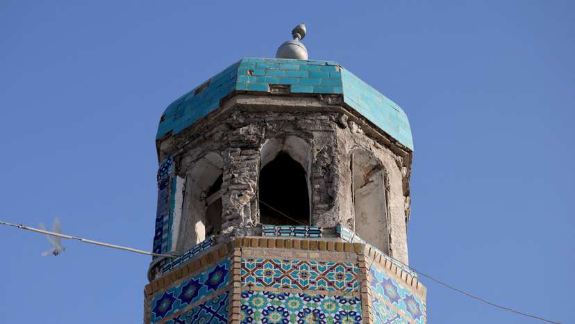 A damaged minaret of the Blue Mosque after the mosque sustained minor damage following a recent earthquake in Mazar-i-Sharif
