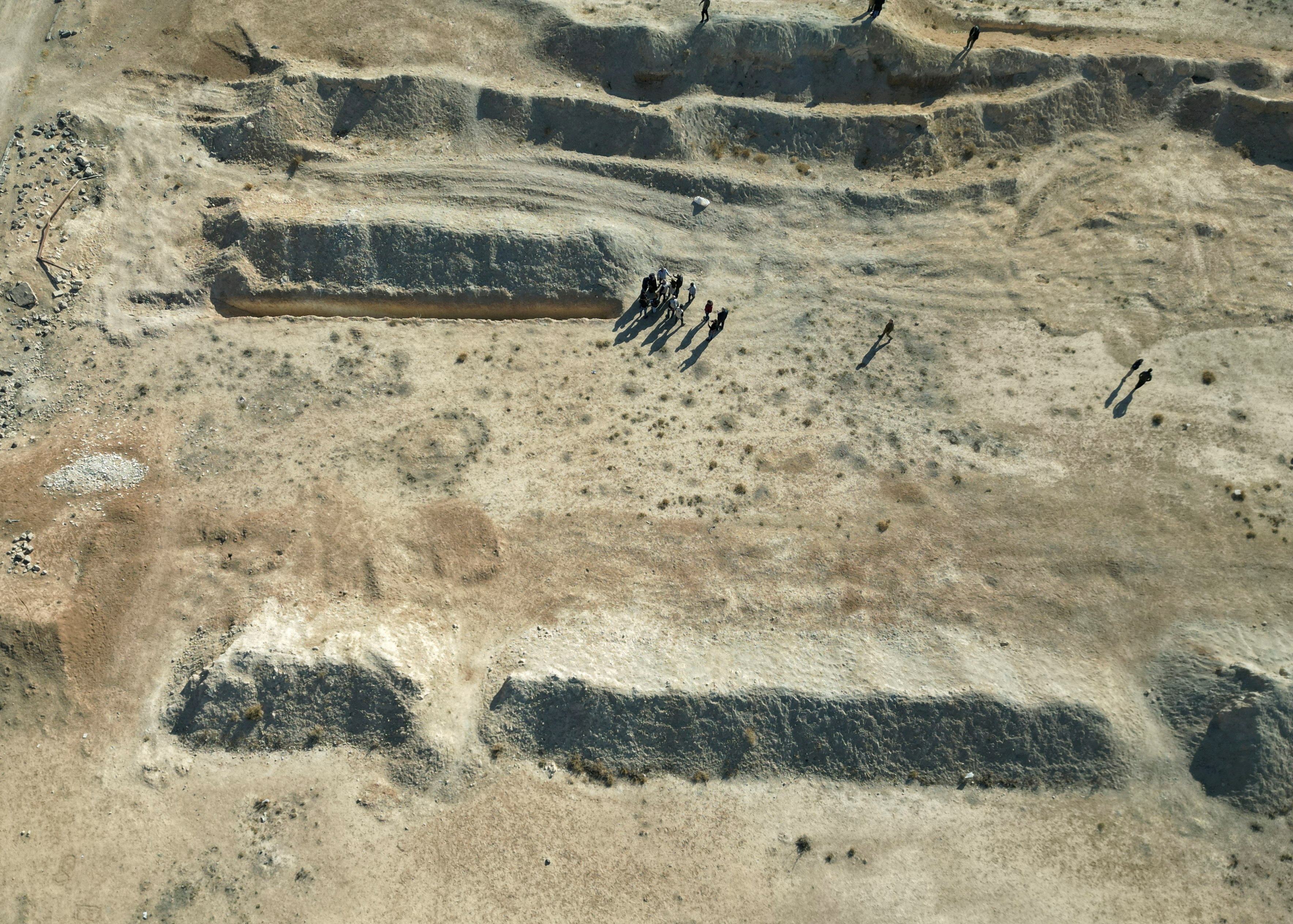 A drone view shows the site of a mass grave from the rule of Syria's Bashar al-Assad, in Najha