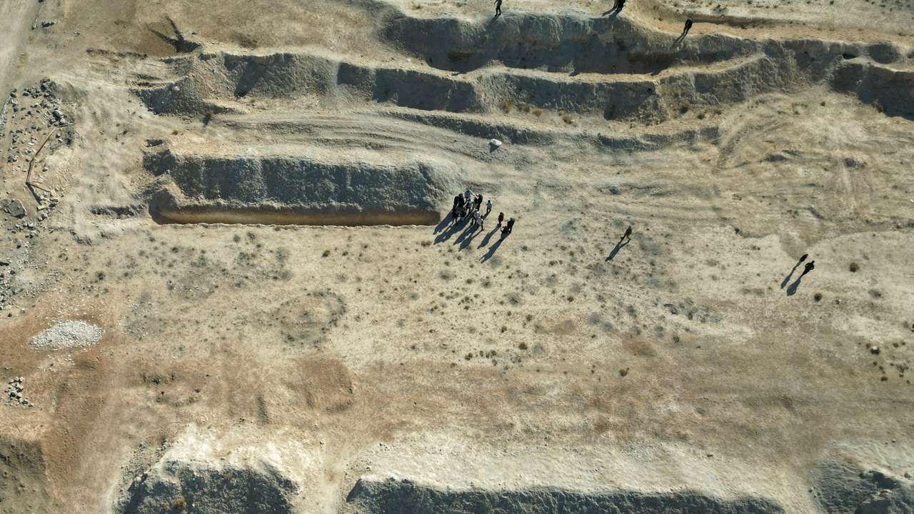 A drone view shows the site of a mass grave from the rule of Syria's Bashar al-Assad, in Najha