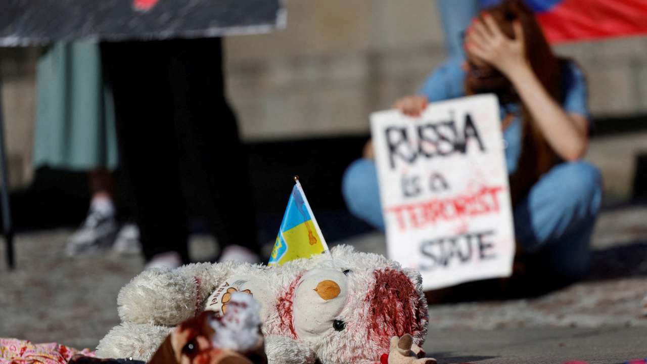 People attend a rally condemning a recent Russia's attack on Ukraine in Prague