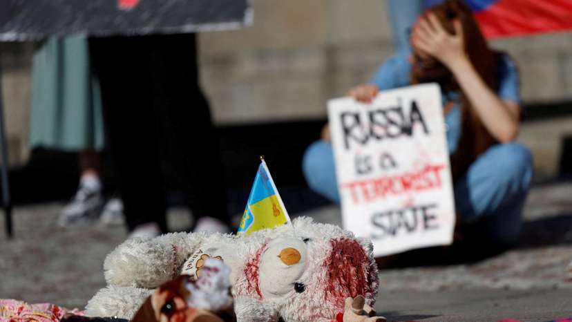 People attend a rally condemning a recent Russia's attack on Ukraine in Prague