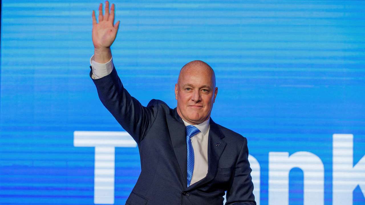 FILE PHOTO: Christopher Luxon, Leader of the National Party waves to supporters in Auckland