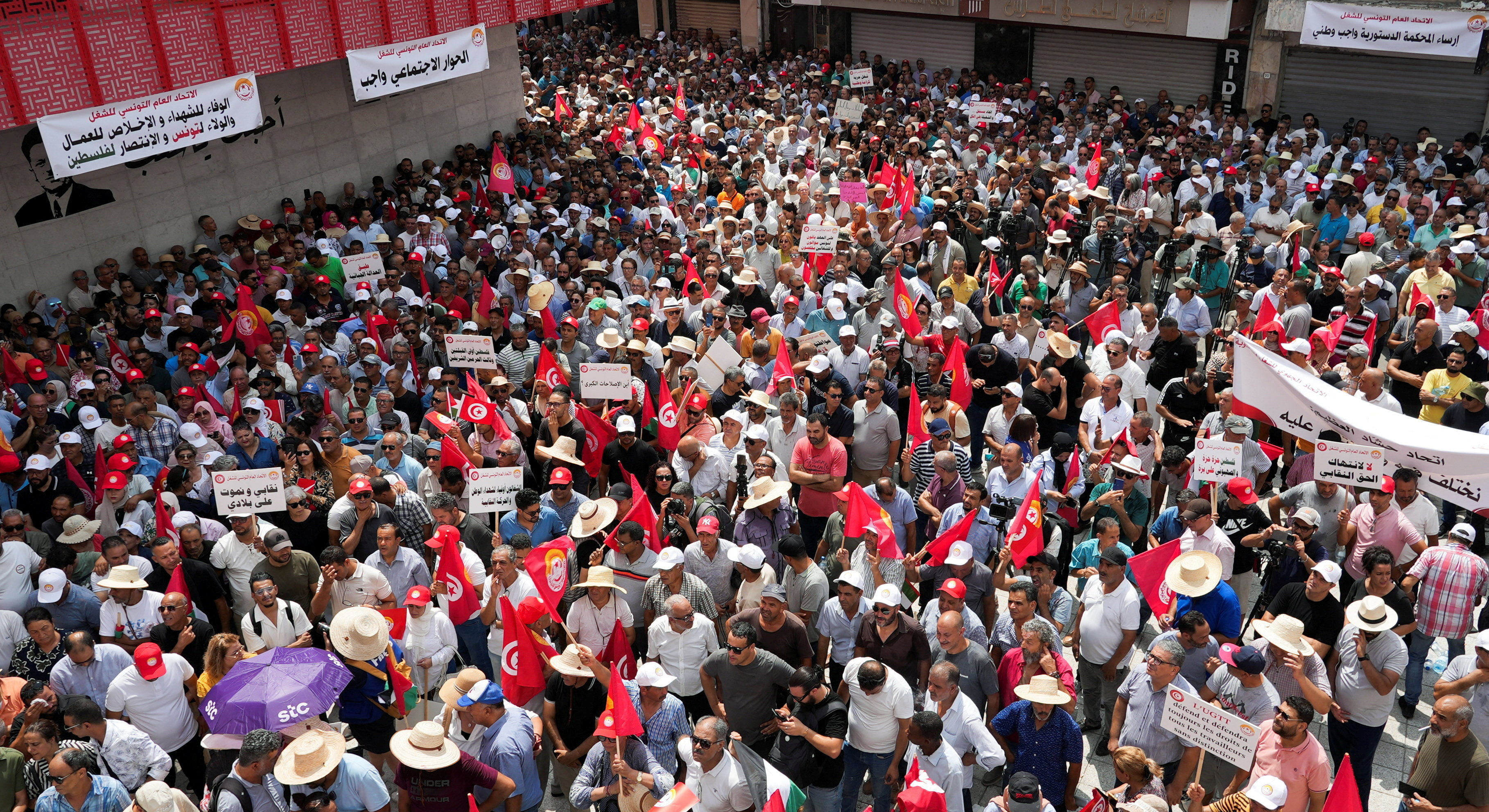 Members of the Tunisian General Labour Union (UGTT) rally in Tunis