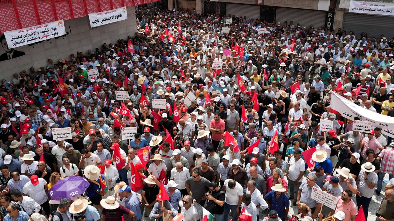 Members of the Tunisian General Labour Union (UGTT) rally in Tunis