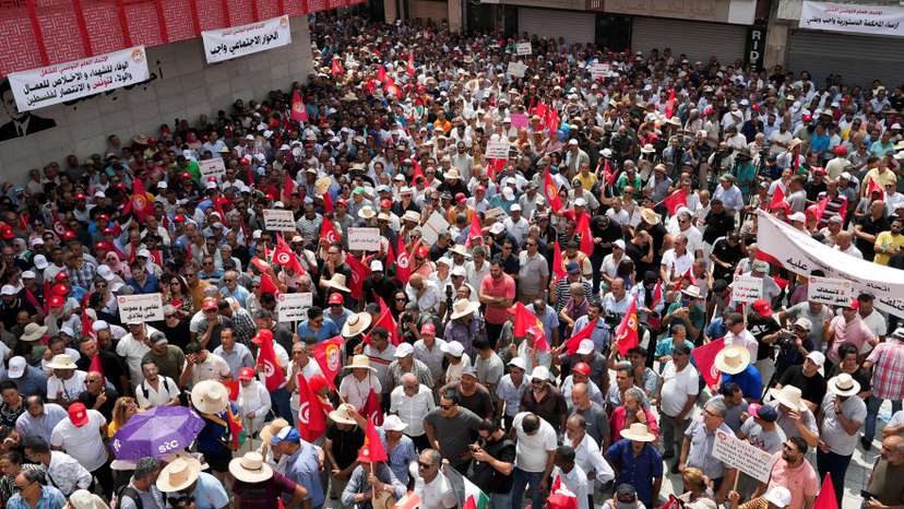 Members of the Tunisian General Labour Union (UGTT) rally in Tunis