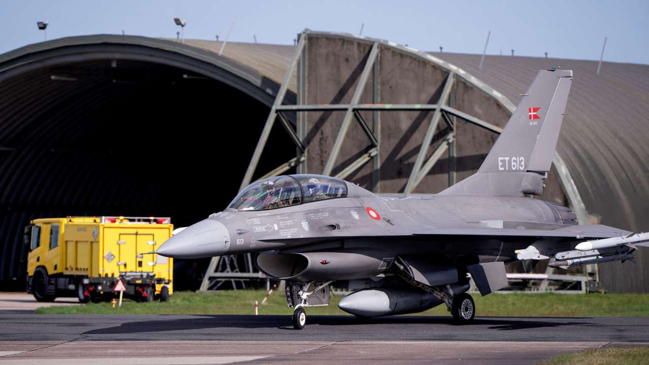 Argentina's Minister of Defence Luis Alfonso Petri arrives in a Danish F-16 aircraft at Skrydstrup Airport where he meets with Denmark's Minister of Defence Troels Lund Poulsen, in Jutland