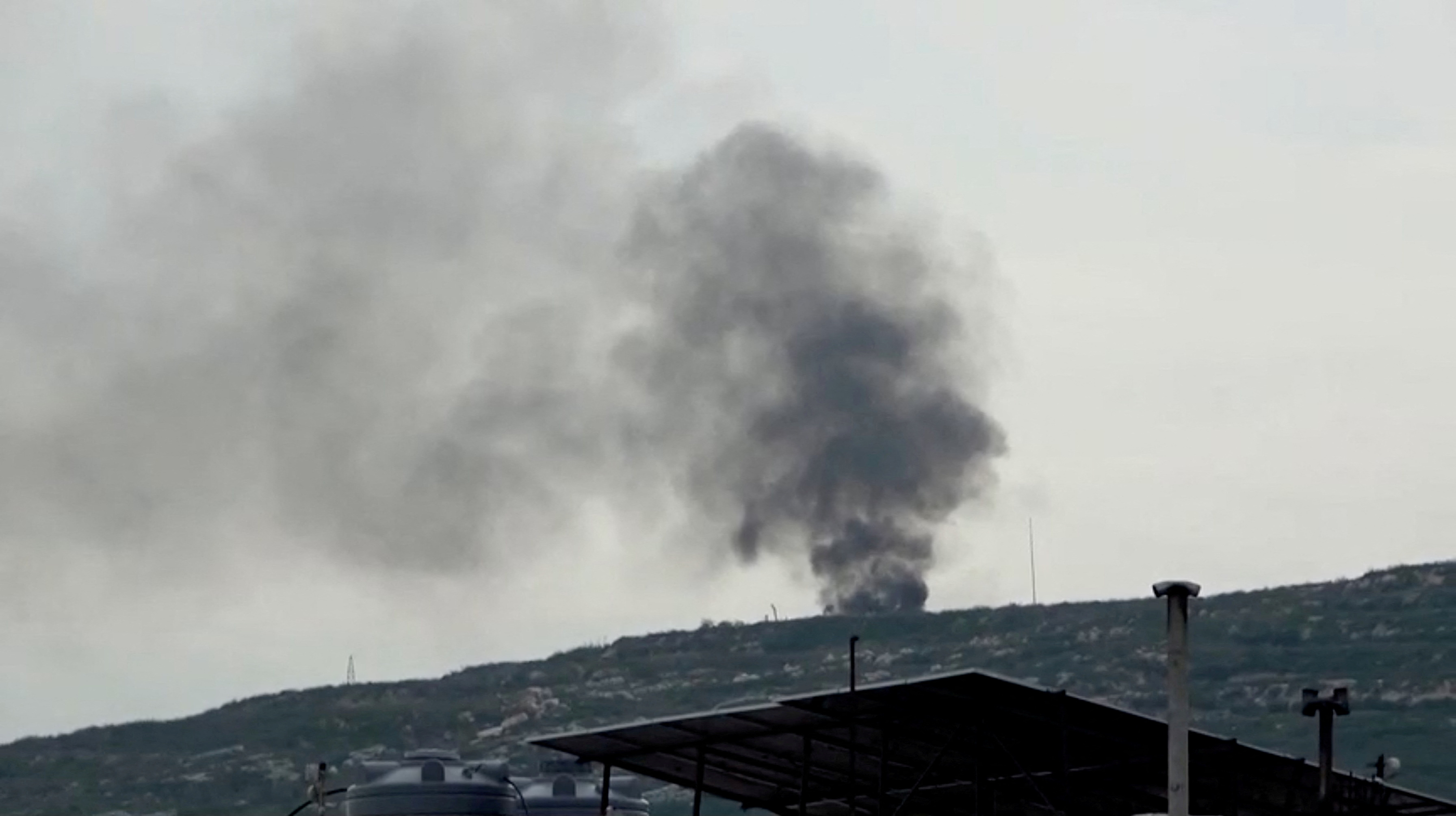 Smoke rises from a site believed to have been hit by an Israeli strike, in southern Lebanon