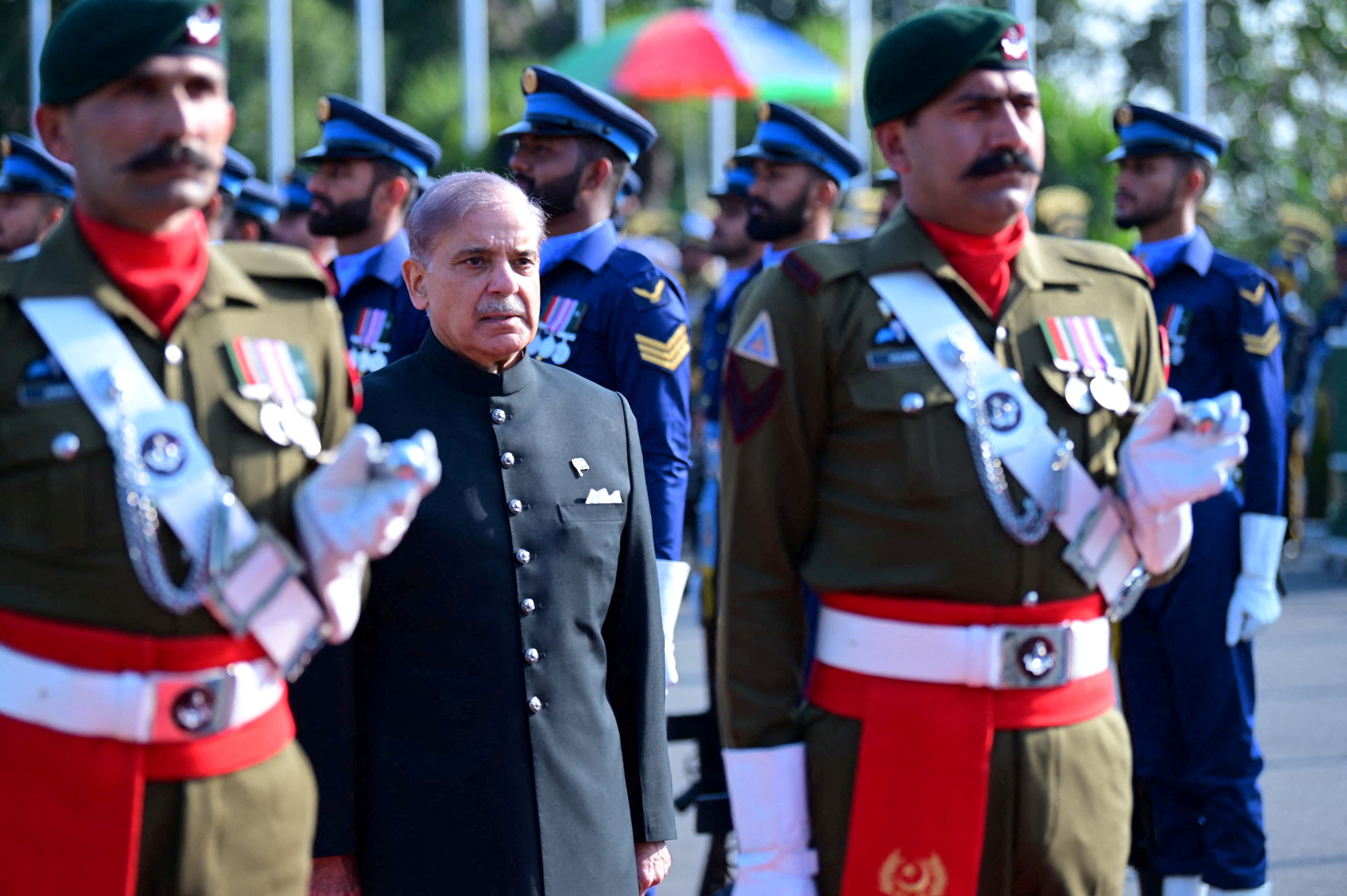 FILE PHOTO: Pakistan's newly elected Prime Minister Shehbaz Sharif, inspects the honor guard at the Prime Minister's House in Islamabad