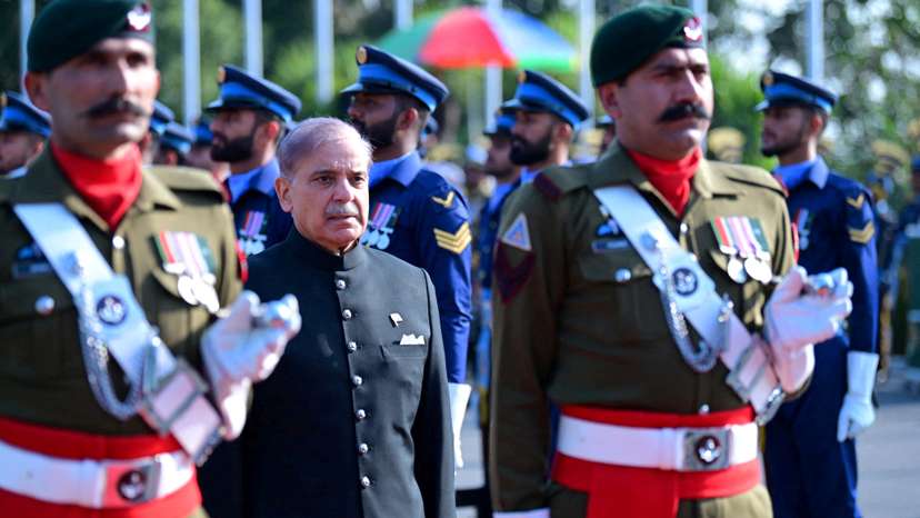 FILE PHOTO: Pakistan's newly elected Prime Minister Shehbaz Sharif, inspects the honor guard at the Prime Minister's House in Islamabad