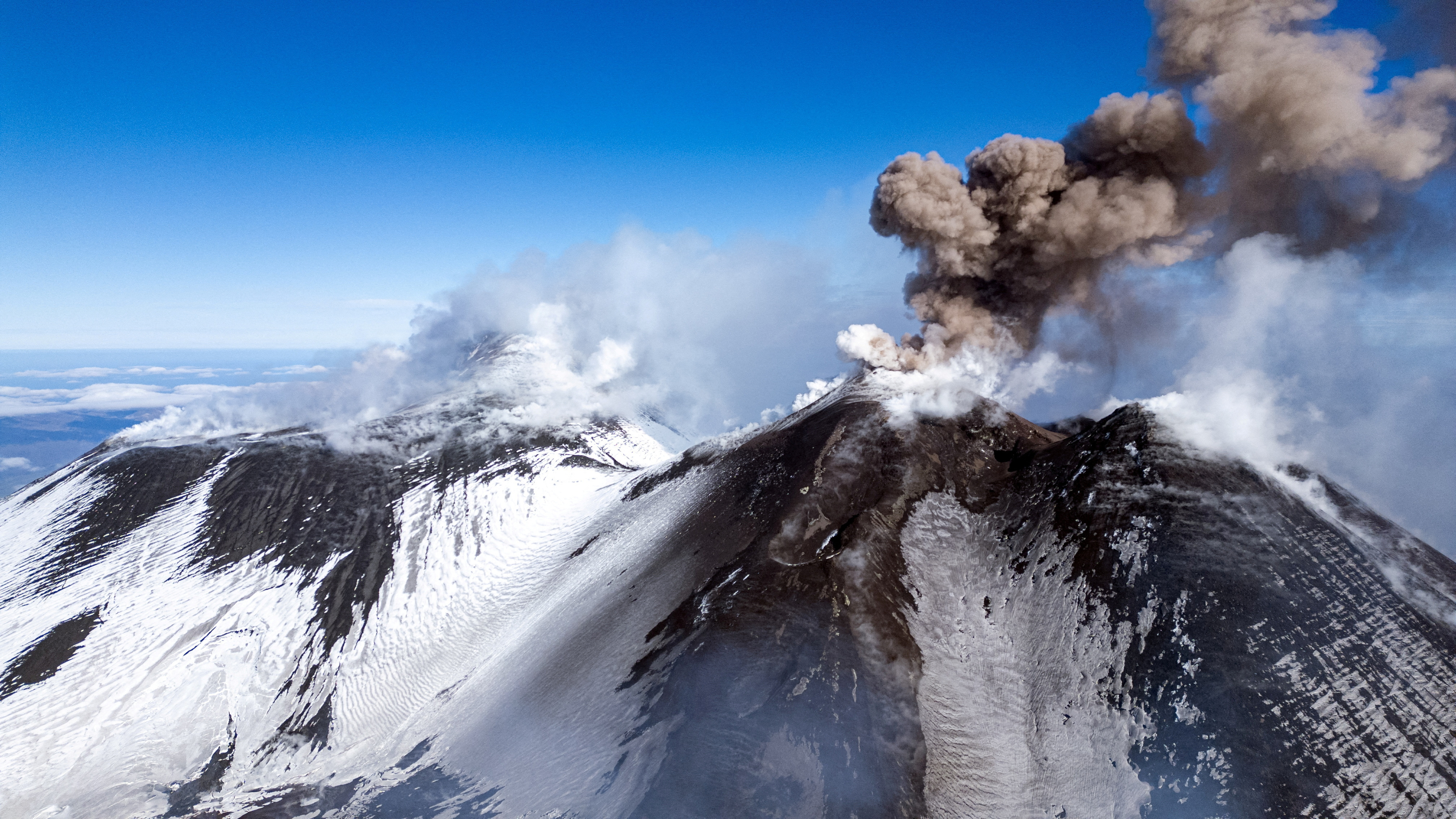 Italy's Mount Etna erupts