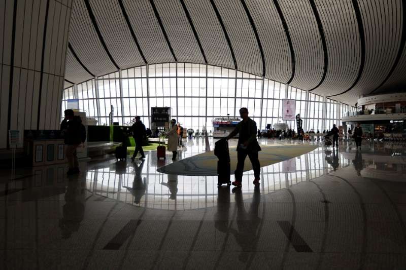 Travellers at Beijing Daxing International Airport