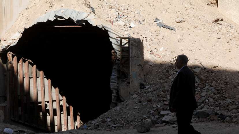Man walks past a shelter used by residents to protect themselves from attacks in Douma, where a suspected chemical attack took place in 2018 under the rule of Syria's Bashar al-Assad