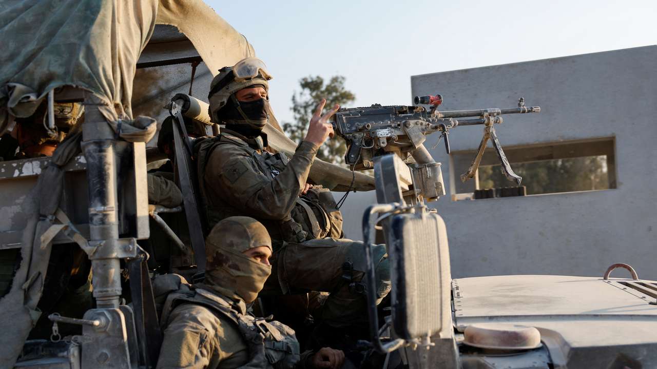 Israeli soldiers prepare to enter Gaza, amid the ongoing conflict between Israel and the Palestinian Islamist group Hamas