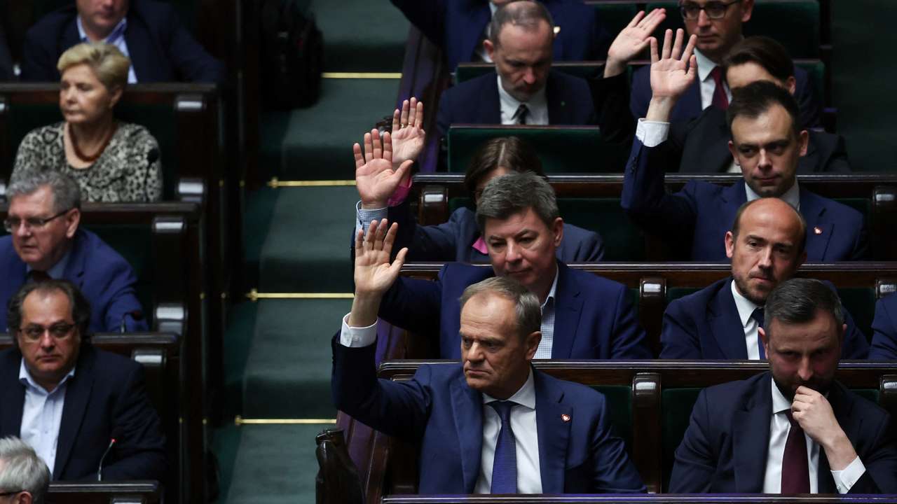 Polish Prime Minister Donald Tusk votes on sending four bills on the liberalisation of abortion laws to be analysed by a special commission, at the parliament in Warsaw