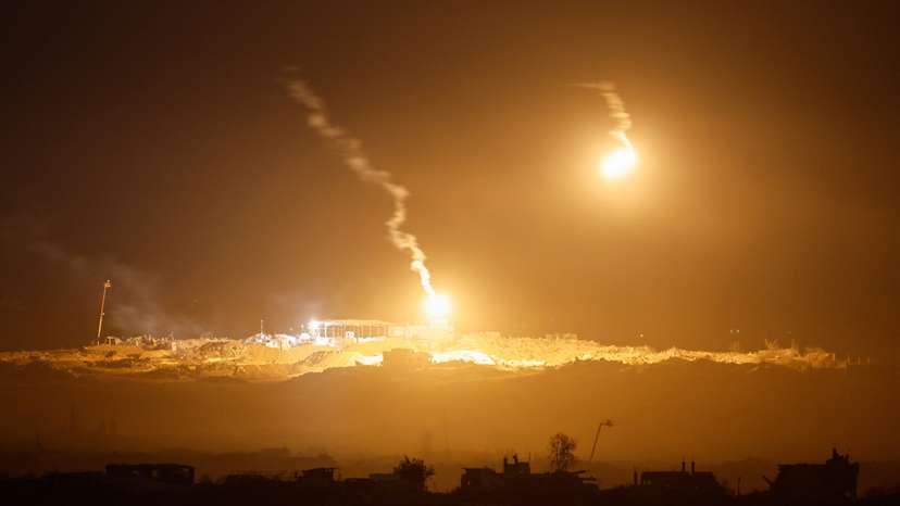 IDF flares light sky above Gaza seen from Israeli side