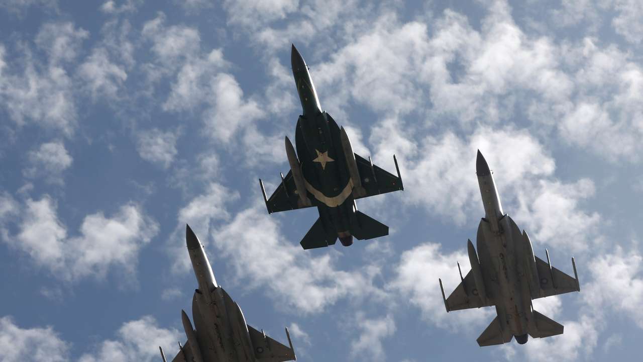 Pakistan Air Force JF-17 Thunder jets perform to commemorate Pakistan Air Force's 'Operation Swift Retort', during an air show in Karachi