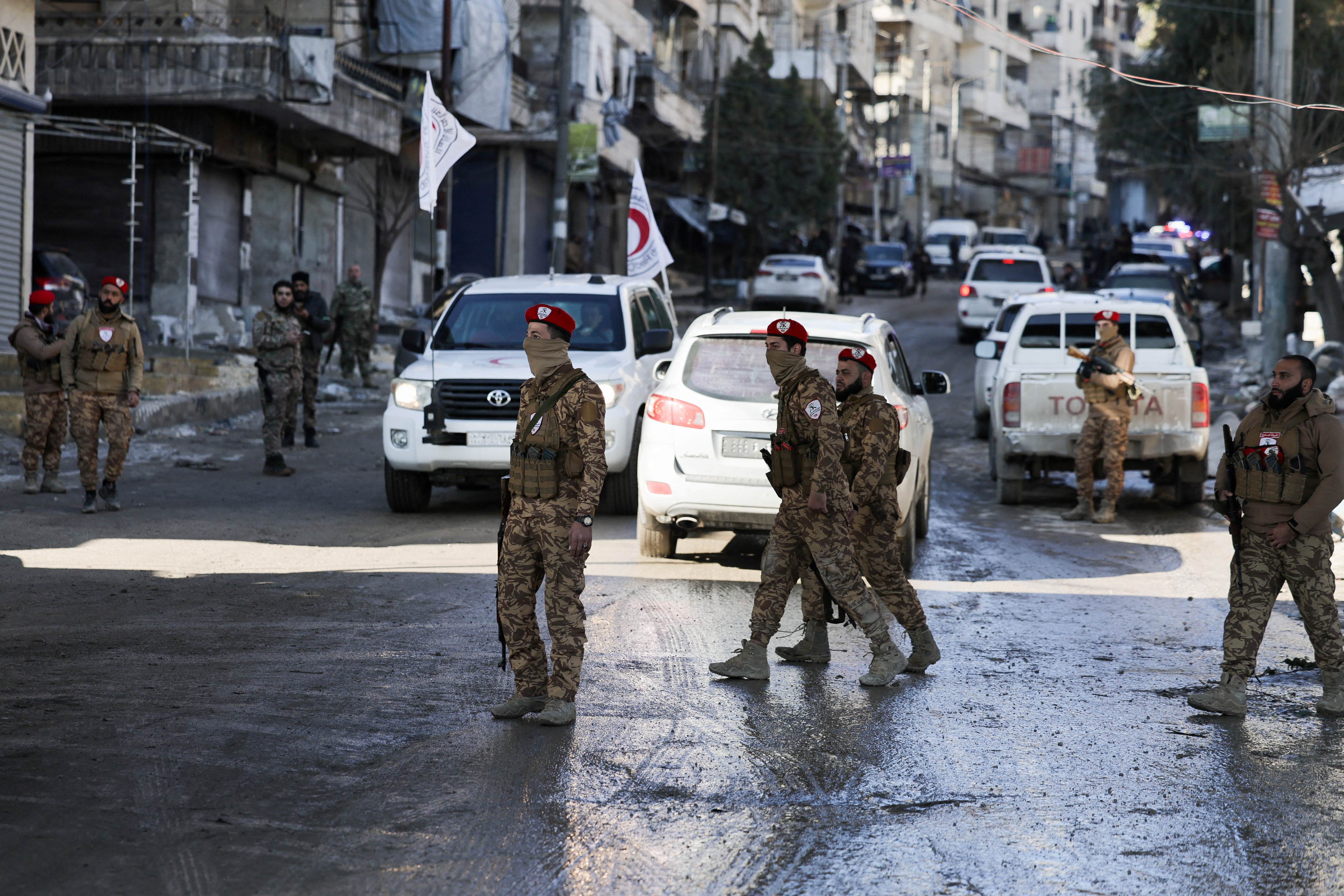 Members of the general security forces at the Sheikh Maksoud neighbourhood after taking control of the area, in Aleppo