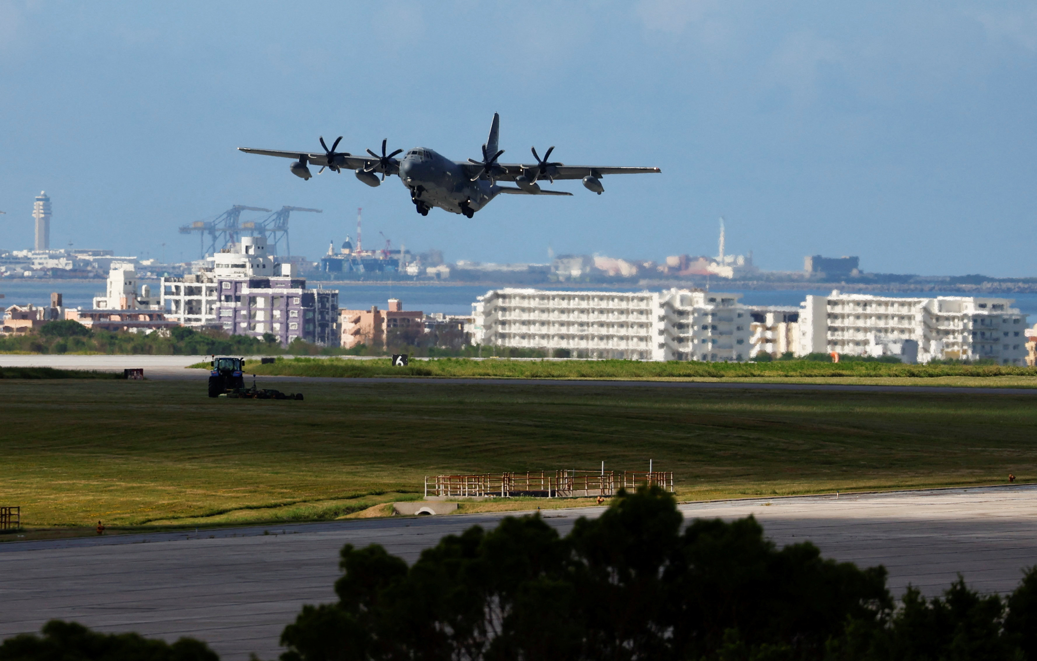 A U.S. military plane takes off at the Kadena U.S. Air Force Base in Kadena Town on the southern island of Okinawa, Japan
