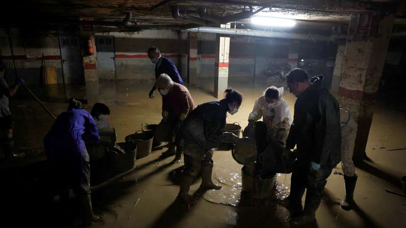 Volunteers continue cleaning up following floods in Valencia