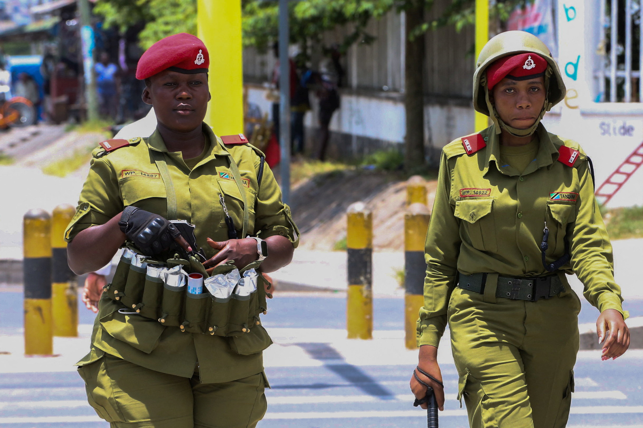Tanzania riot police officers patrol the streets during the protests to condemn a series of kidnappings and murders in Dar es Salaam