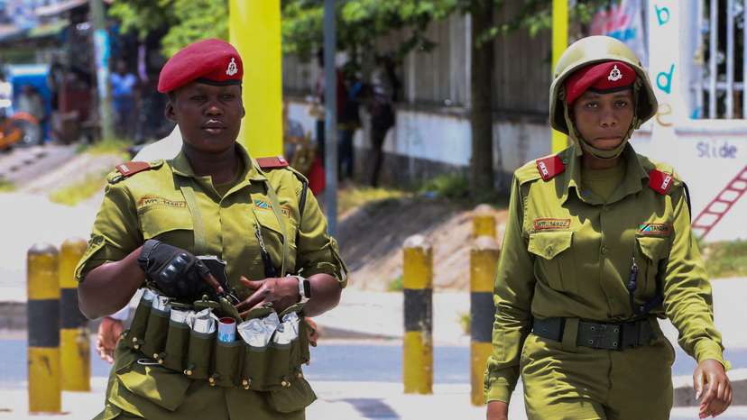 Tanzania riot police officers patrol the streets during the protests to condemn a series of kidnappings and murders in Dar es Salaam