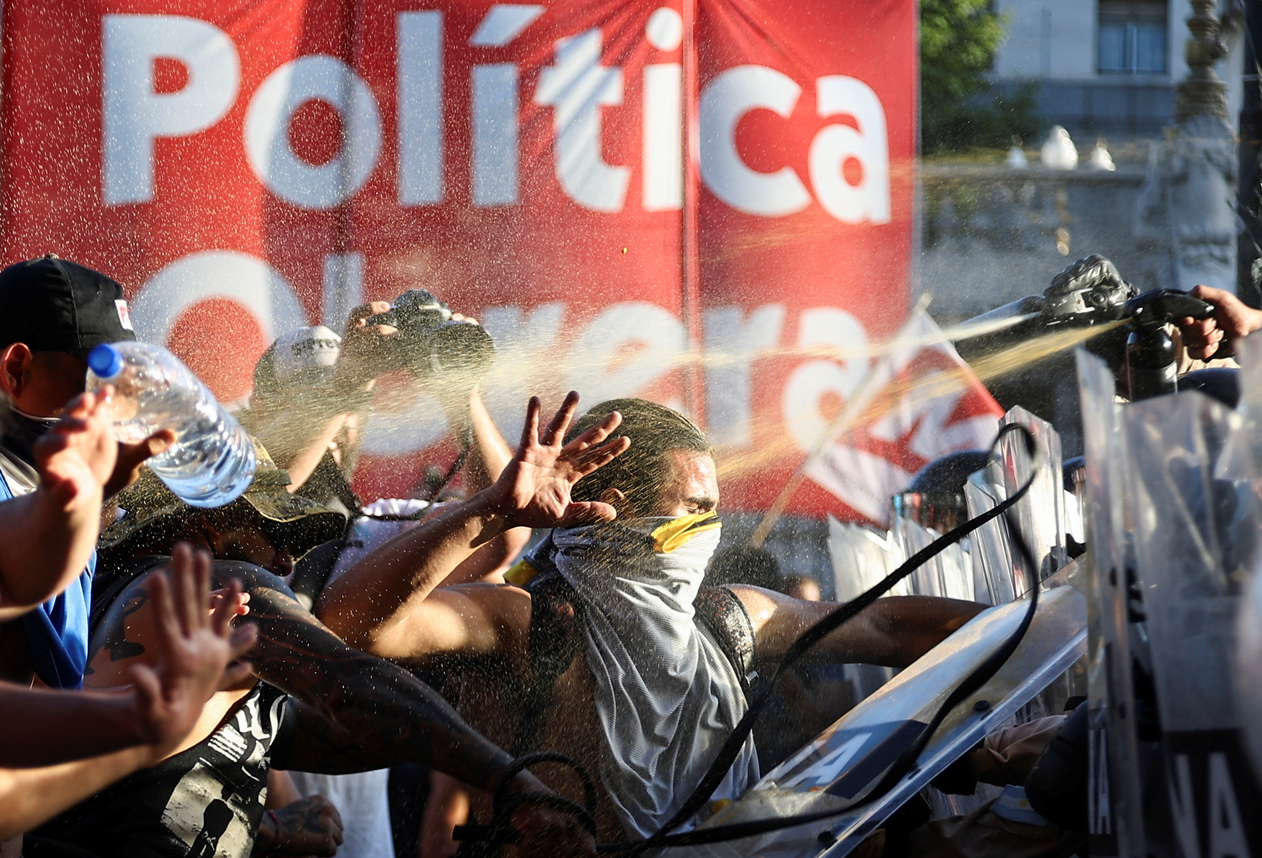 Demonstrators protest as lawmakers debate on Argentina's President Javier Milei's "omnibus bill," in Buenos Aires