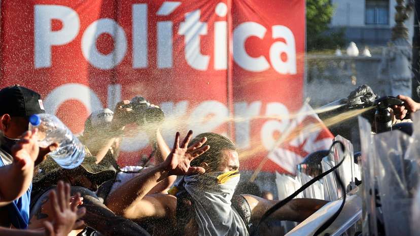 Demonstrators protest as lawmakers debate on Argentina's President Javier Milei's "omnibus bill," in Buenos Aires