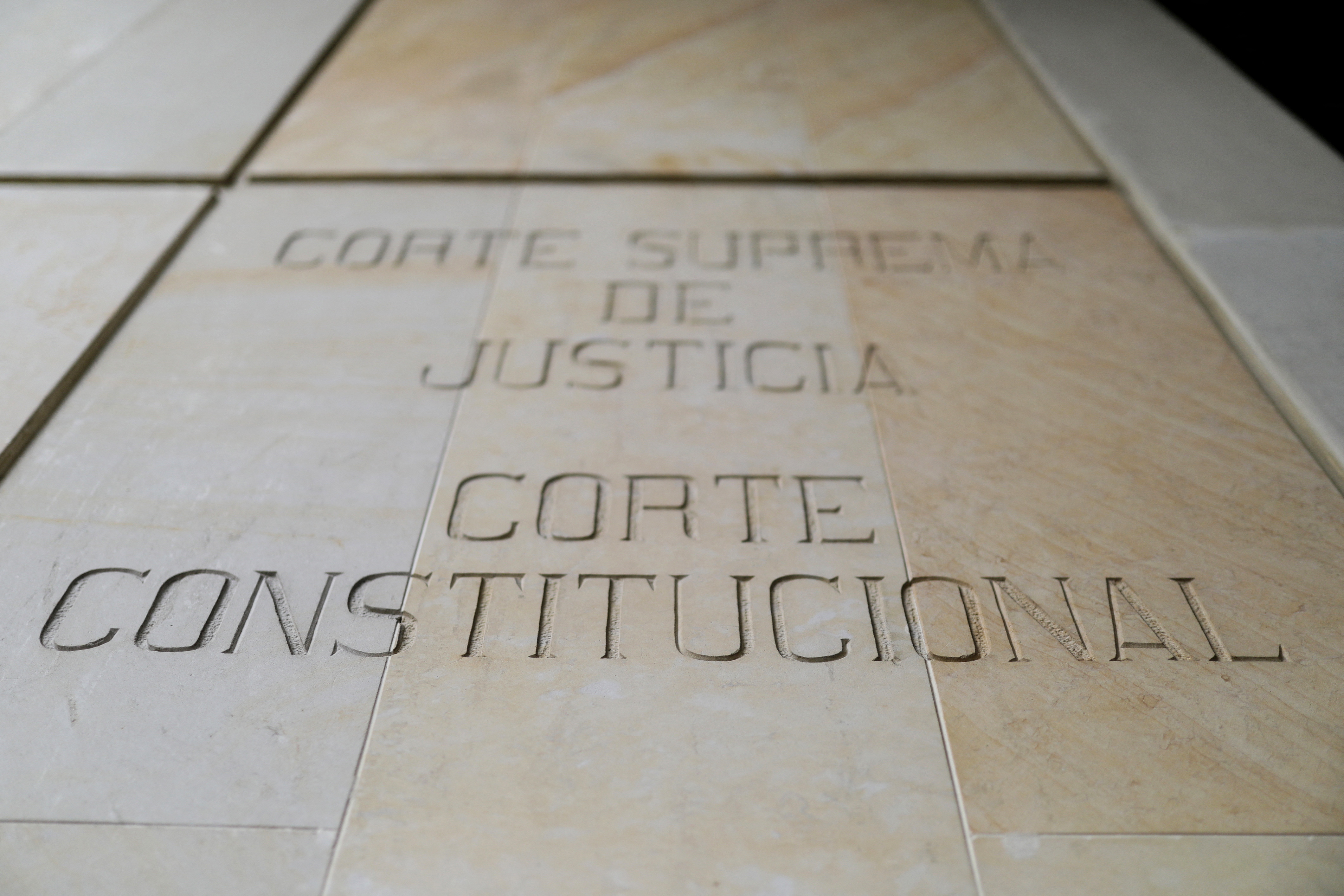 FILE PHOTO: A wall with the carved phrase that reads "Supreme Court of Justice, Constitutional Court" is seen on the facade of the Palace of Justice in Bogota