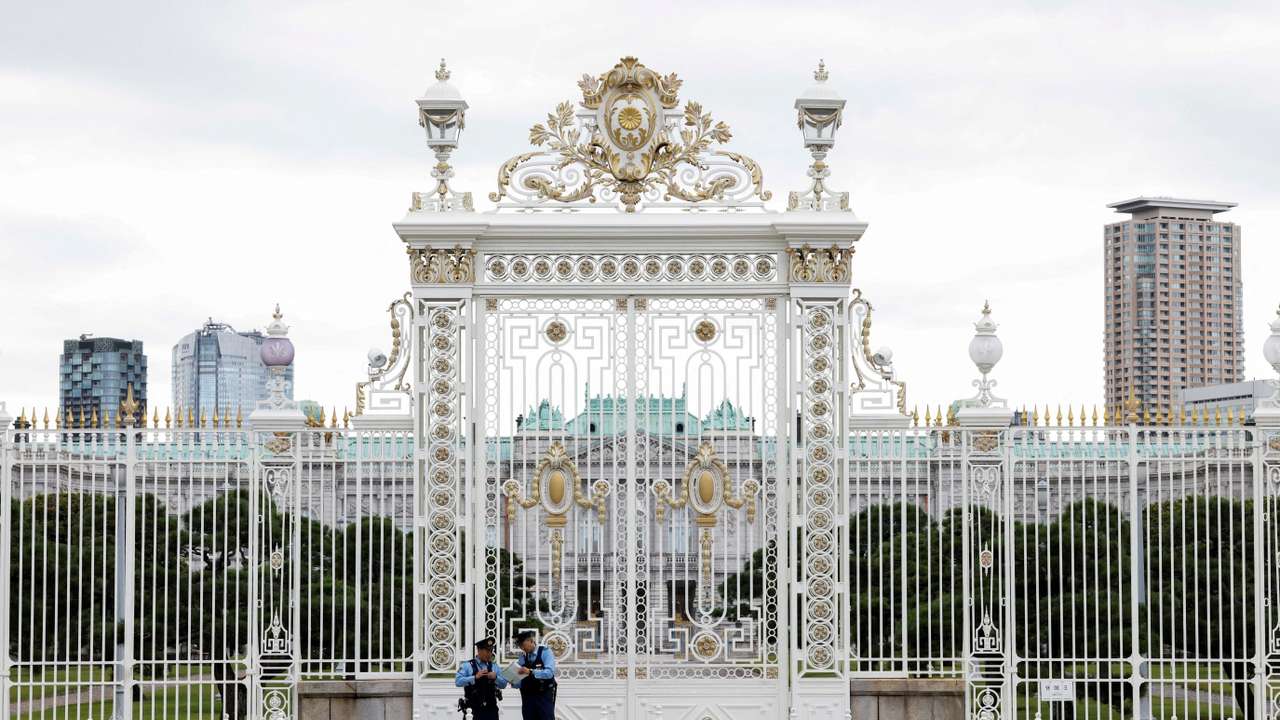 Police officers stand in front of the the Akasaka Palace State Guest House in Tokyo