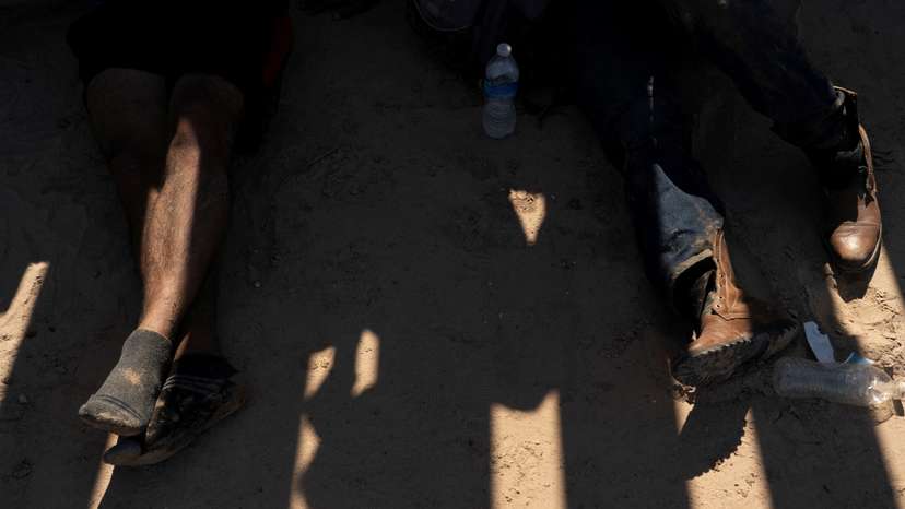 Migrants cross the U.S.-Mexico border in Texas