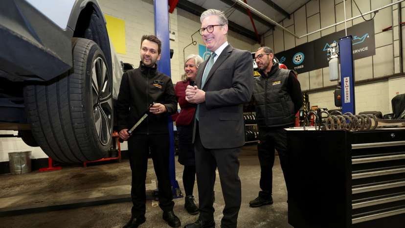 FILE PHOTO: Britain's Prime Minister Keir Starmer visits a local mechanics business in Cambridgeshire