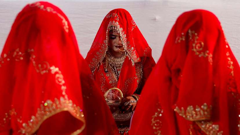 FILE PHOTO: Muslim women are seen during a mass marriage ceremony, in which, 51 Muslim couples took their wedding vows, in Mumbai