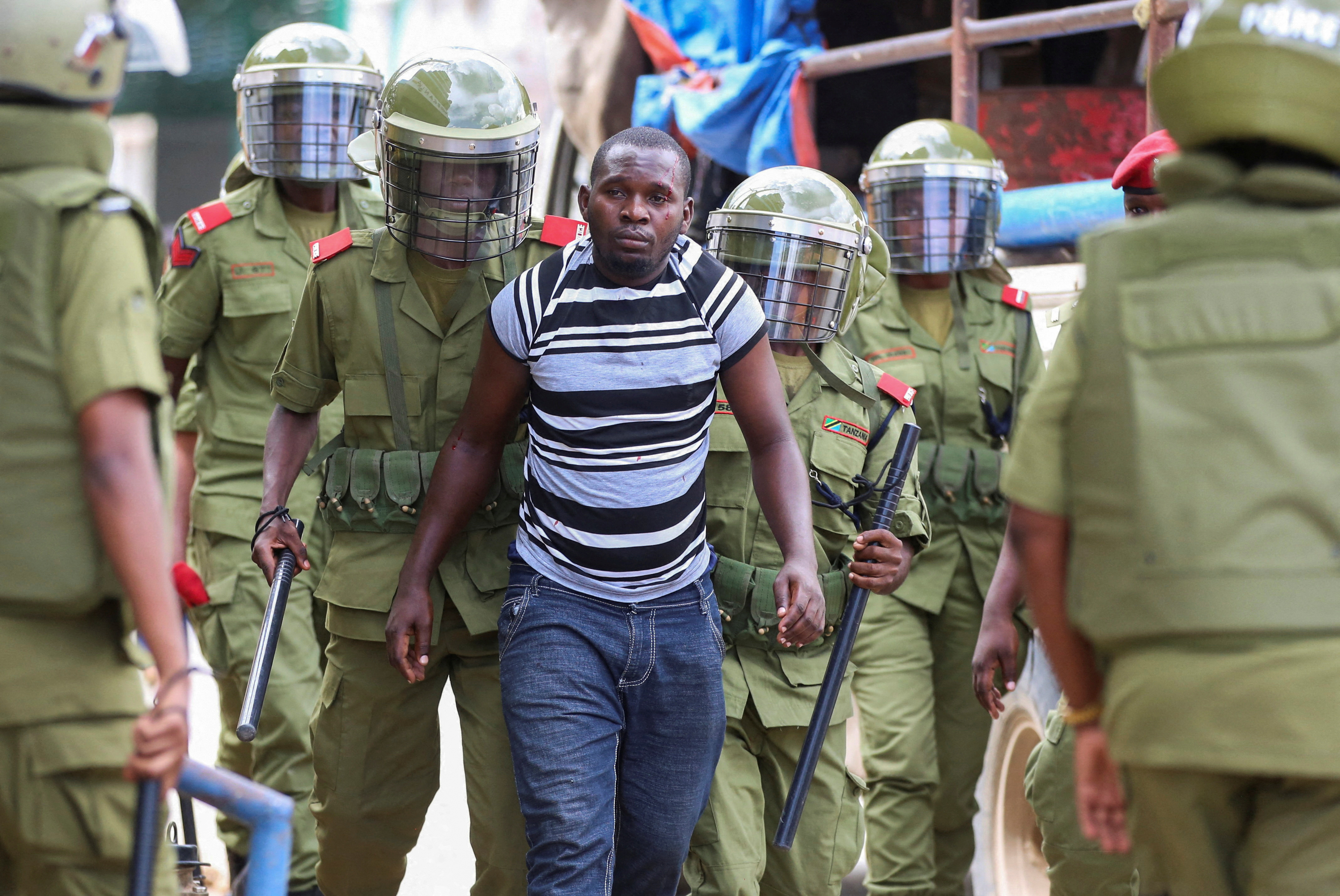 Tanzania police detain opposition officials on way to court, in Dar es Salaam