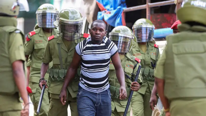 Tanzania police detain opposition officials on way to court, in Dar es Salaam