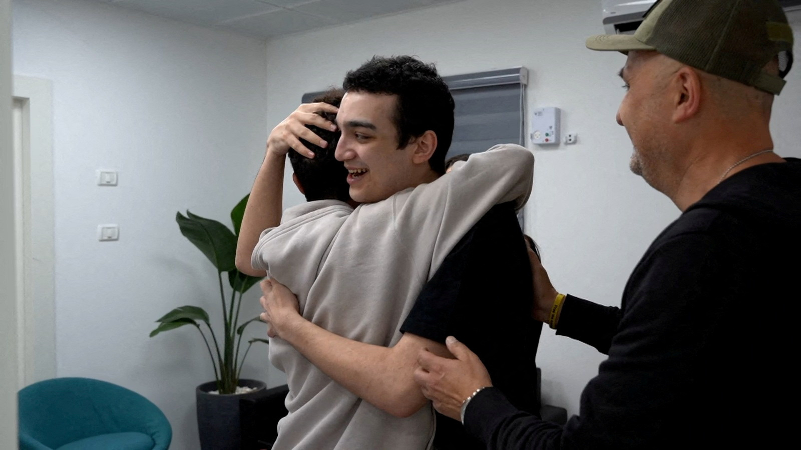 Edan Alexander, who has been released from captivity by Hamas, reunites with his family
