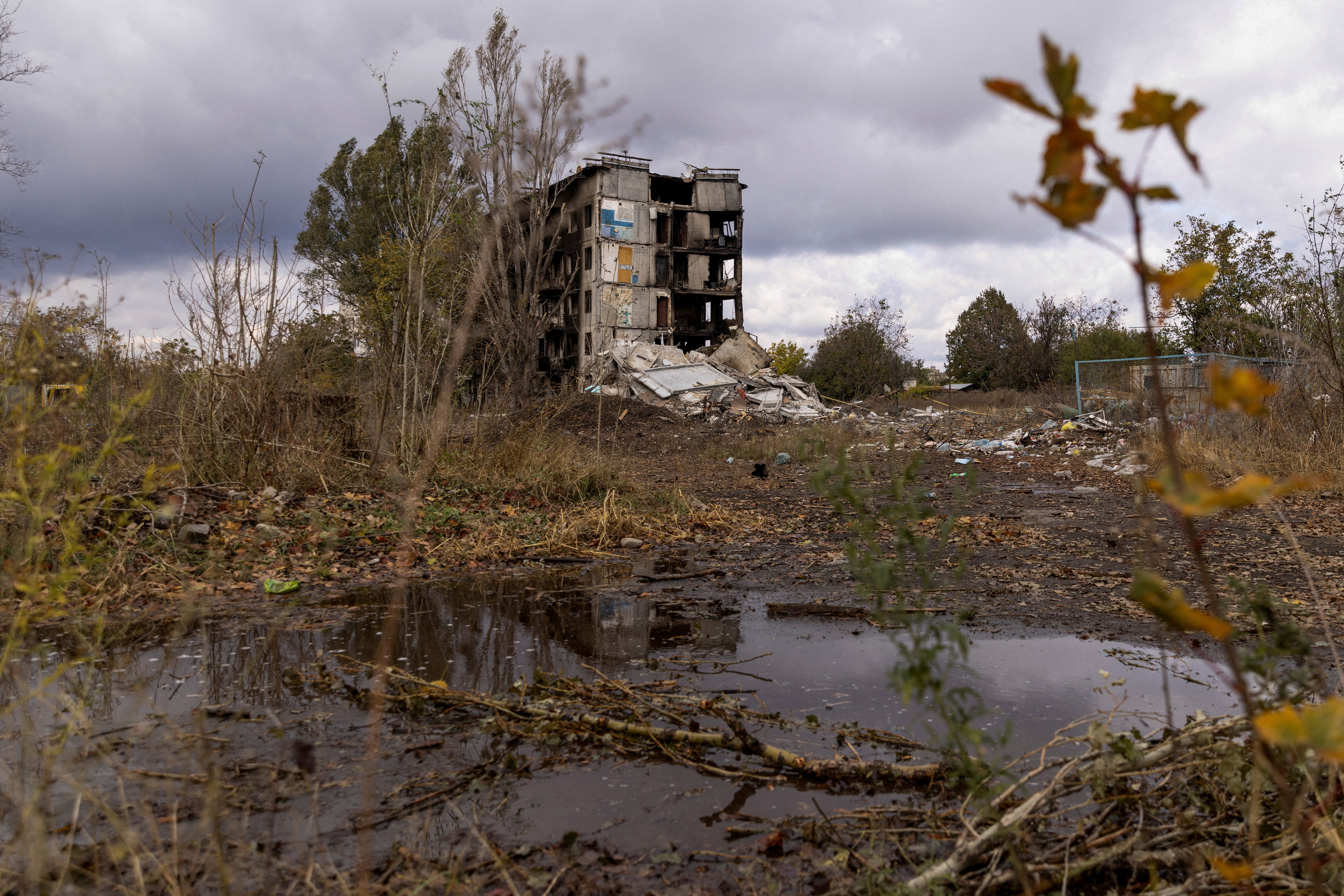 A heavily damaged residential building in Avdiivka