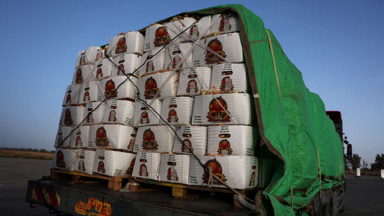 FILE PHOTO: A food aid truck sits abandoned near the entrance to the Kerem Shalom border crossing, as military operations continue in the southern Gaza city of Rafah, at an area outside Kerem Shalom