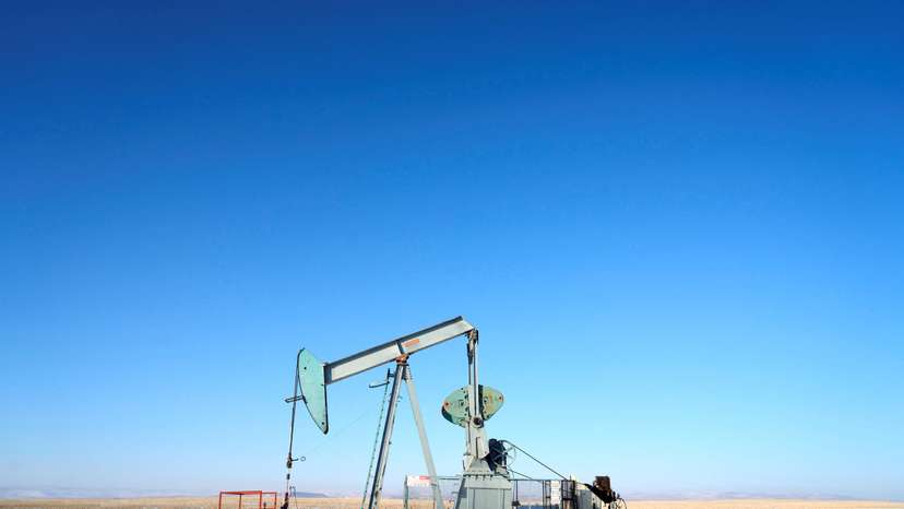 A view of an oil pump jack on the prairies near Claresholm, Alberta
