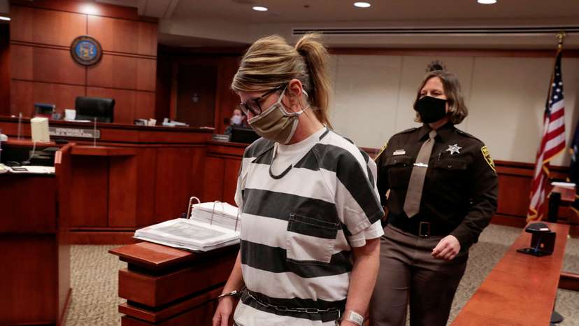 FILE PHOTO: Jennifer Crumbley, parent of accused Oxford High School gunman Ethan Crumbley, is escorted into the courtroom by a Oakland Count Sheriff