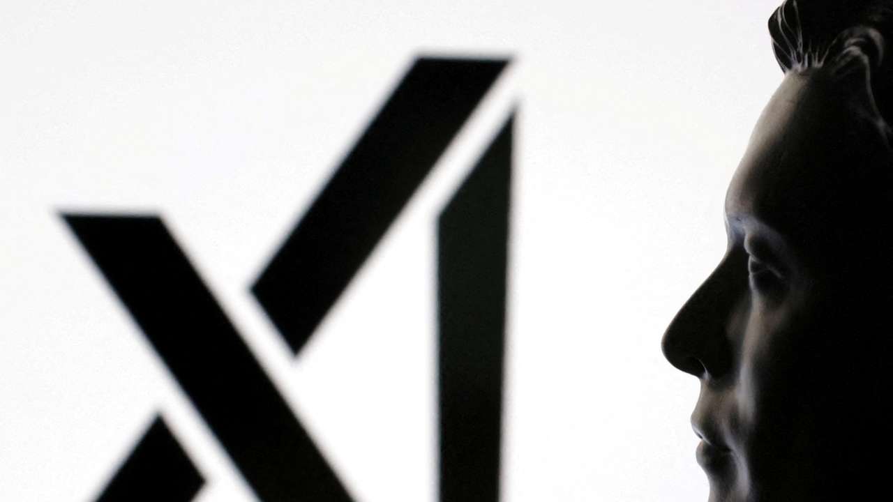 FILE PHOTO: Illustration shows 3D-printed miniature model of Elon Musk and xAI logo