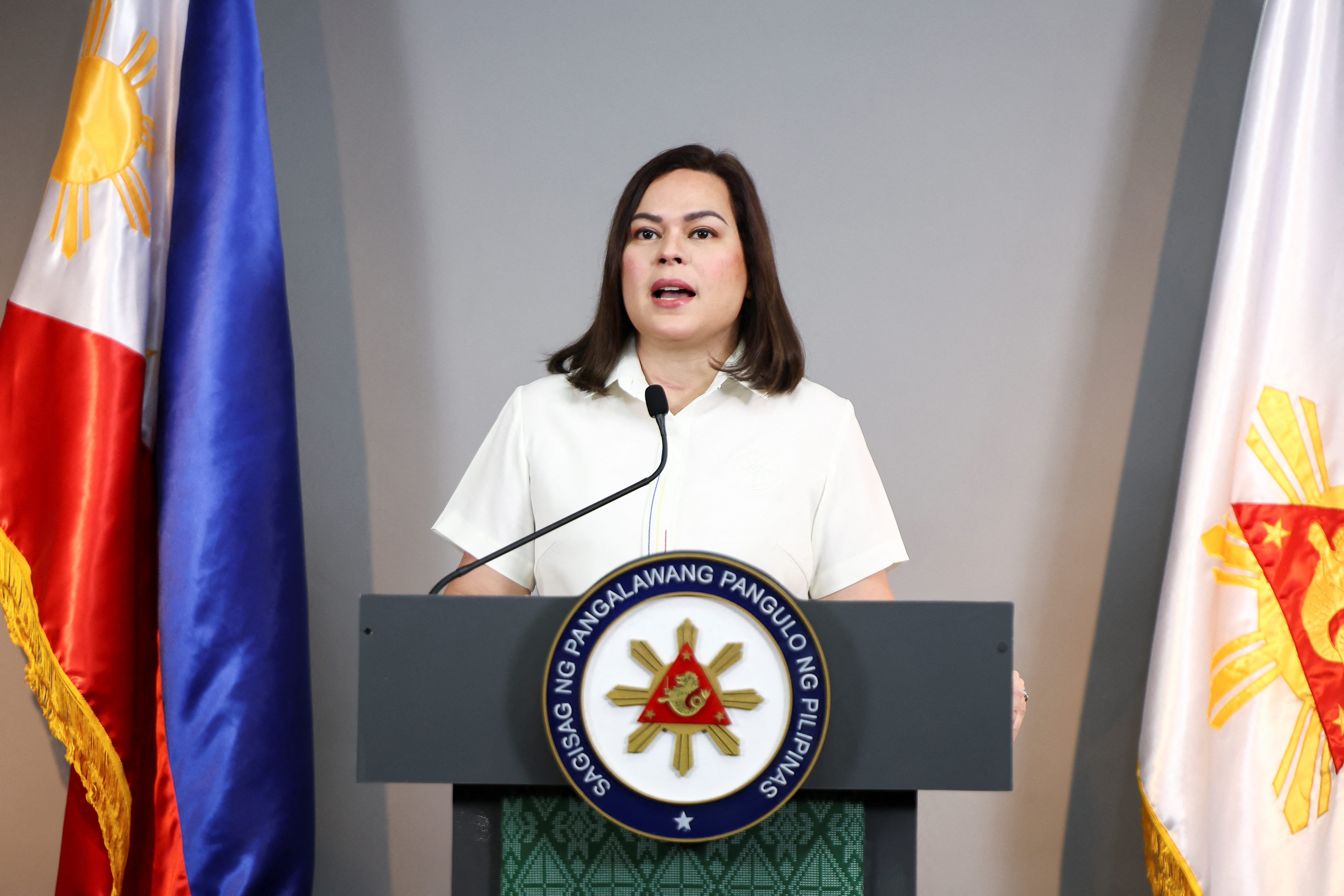 Philippine Vice President Sara Duterte delivers a statement following her impeachment by the lower house of the Congress