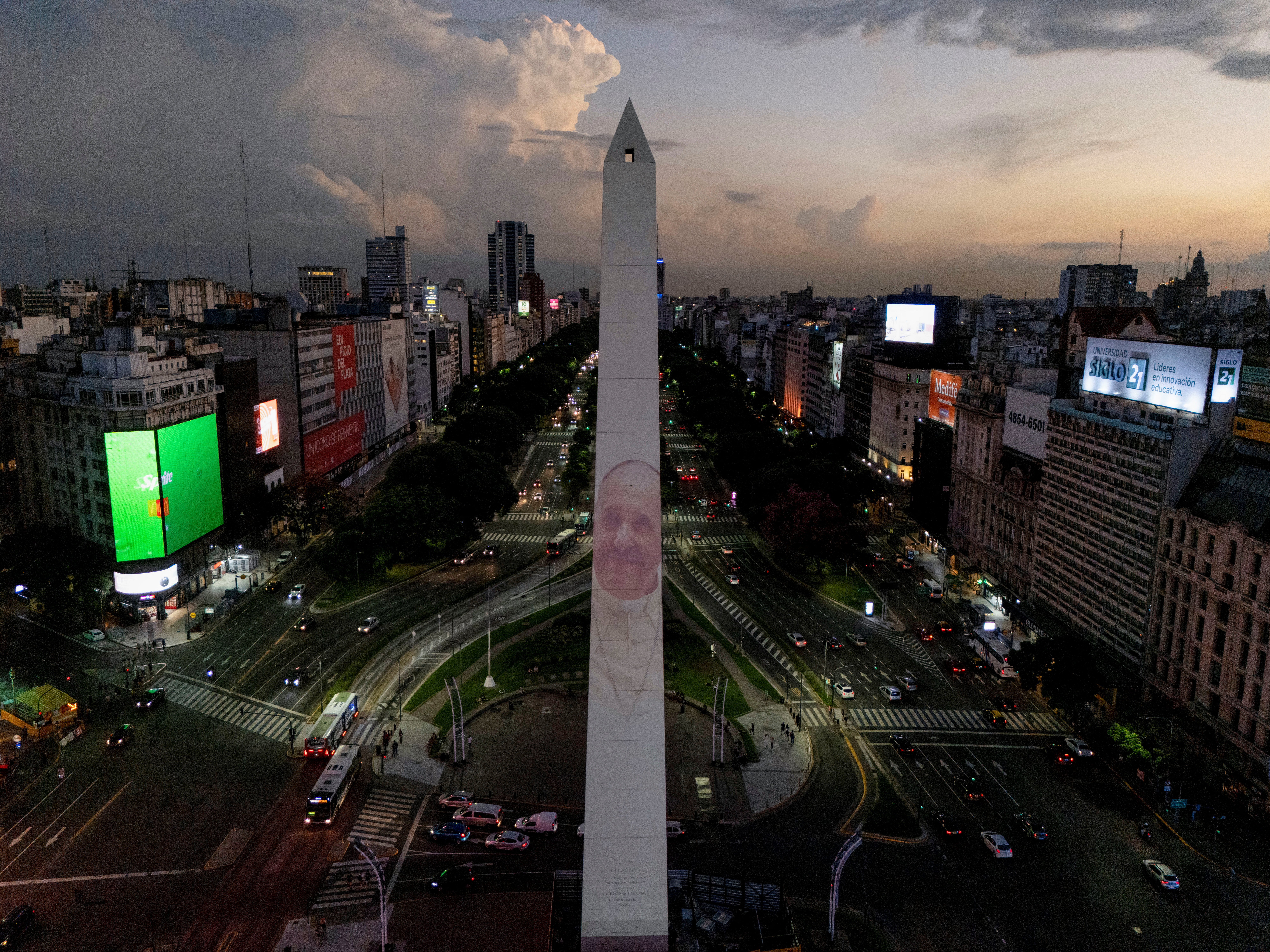 An image of Pope Francis is displayed with a digital video-mapping at the Obelisco