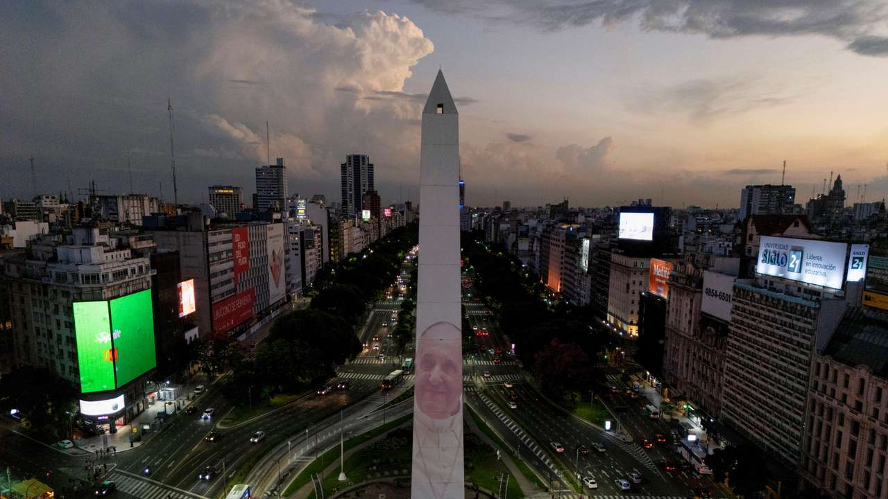 An image of Pope Francis is displayed with a digital video-mapping at the Obelisco