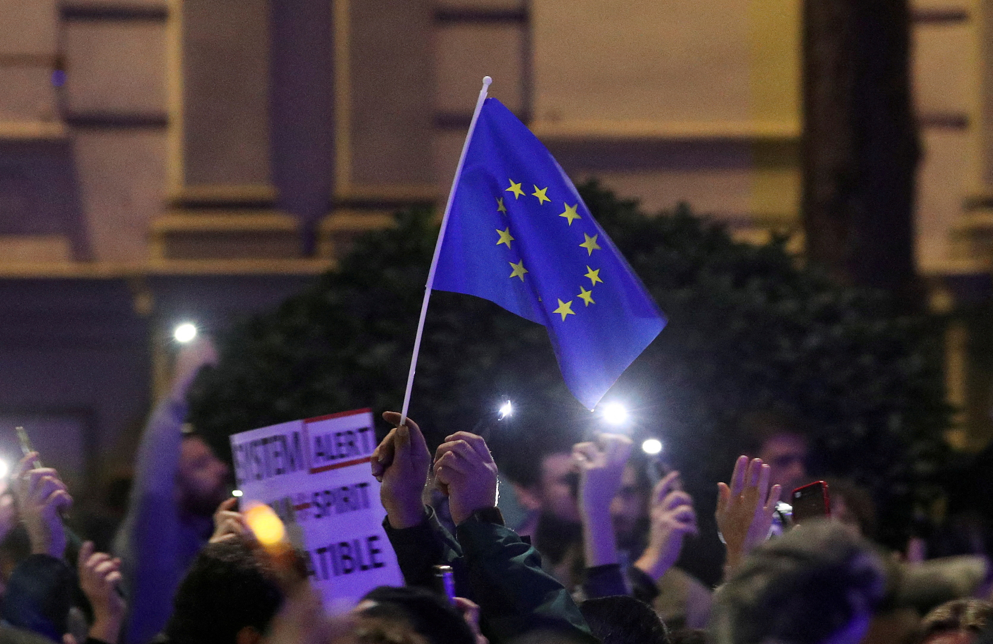 FILE PHOTO: Protesters gather outside Georgian parliament after disputed election
